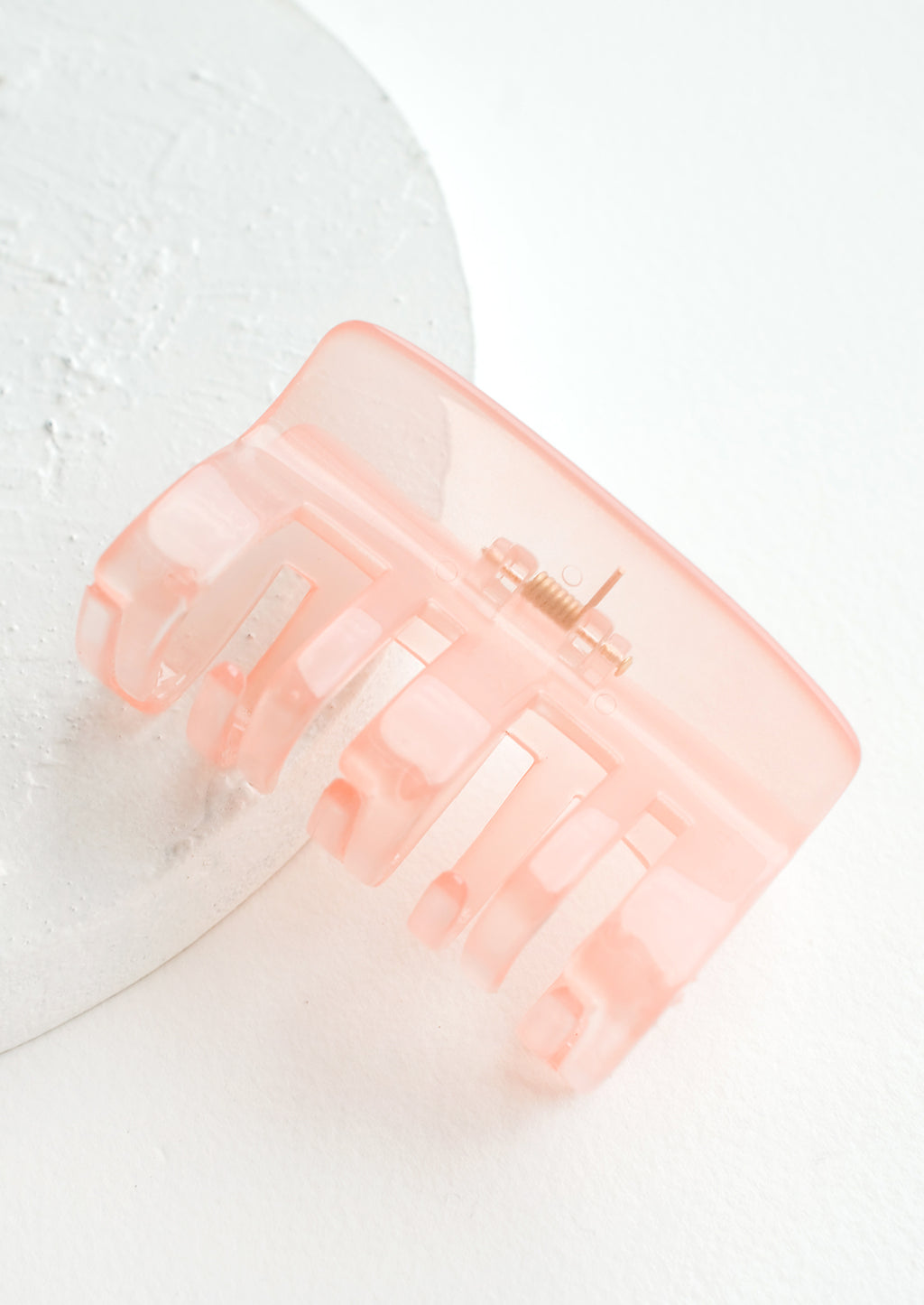 Pink Lemonade: A transparent hair clip in light pink.