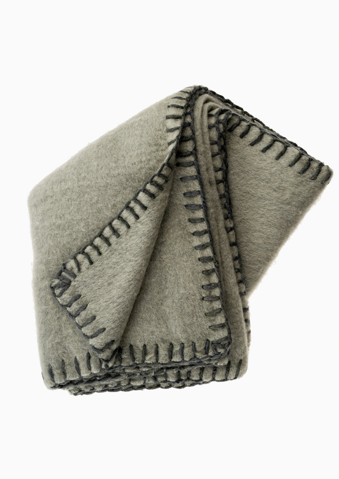 A sage mohair blanket with olive yarn whipstitched trim.