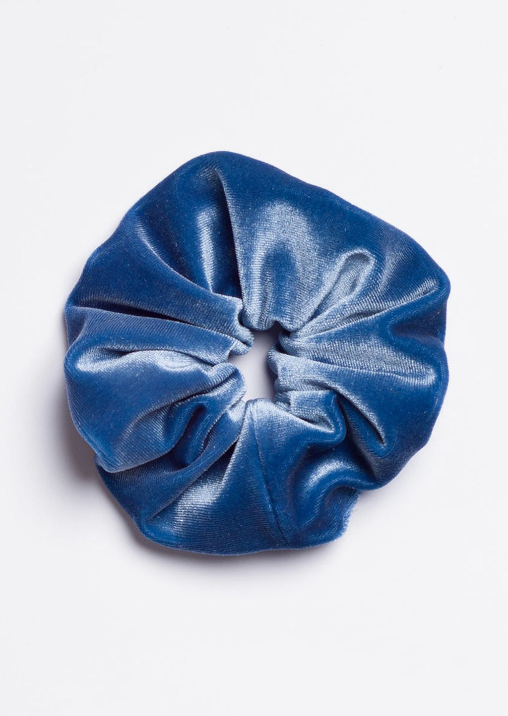 Forget Me Not: A velvet scrunchie in forget me not blue.