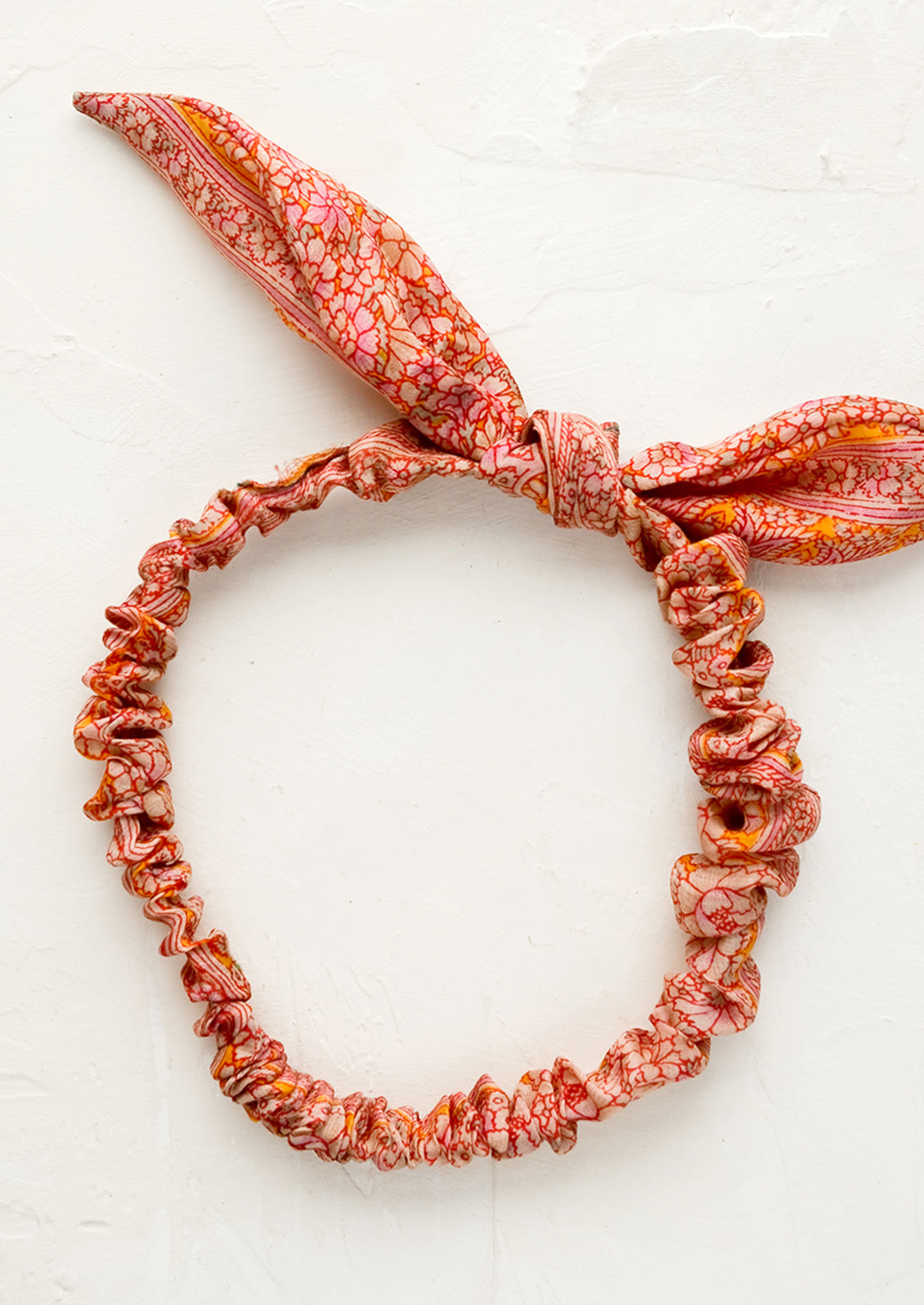 A hair tie made from vintage silk sari.