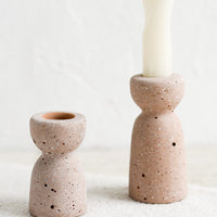 Short / River Rock: Two short and tall brown-pink concrete candleholders with pumice-like texture.