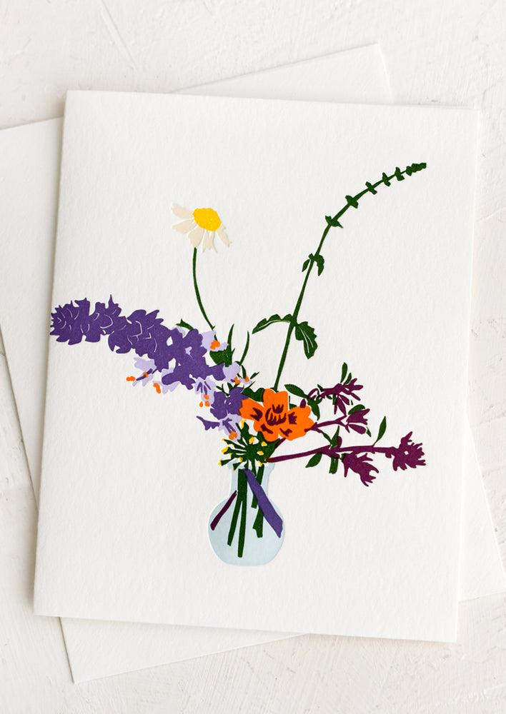 1: A greeting card with letterpress image of colorful flowers in a vase.