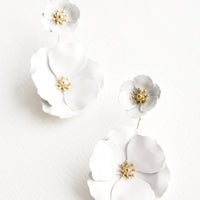 White: Two part true white and gold flower earrings with a small flower post and larger flower drop. 