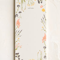 Wild Ideas: A list making notepad with "wild ideas" printed at top with a decorative botanical border.