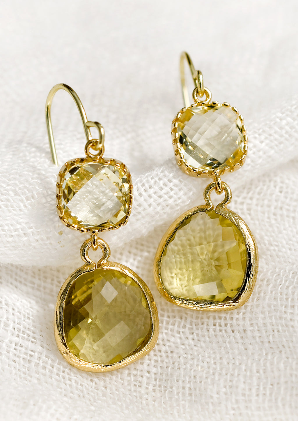 Champagne / Citrine: A pair of two-stone bezeled gem earrings in champagne and citrine.