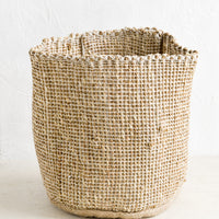 Natural: A soft sided storage bin made from natural seagrass.