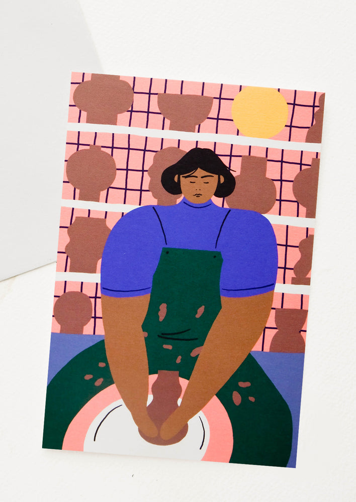 1: Oversized greeting card with illustration of a woman at a potter's wheel