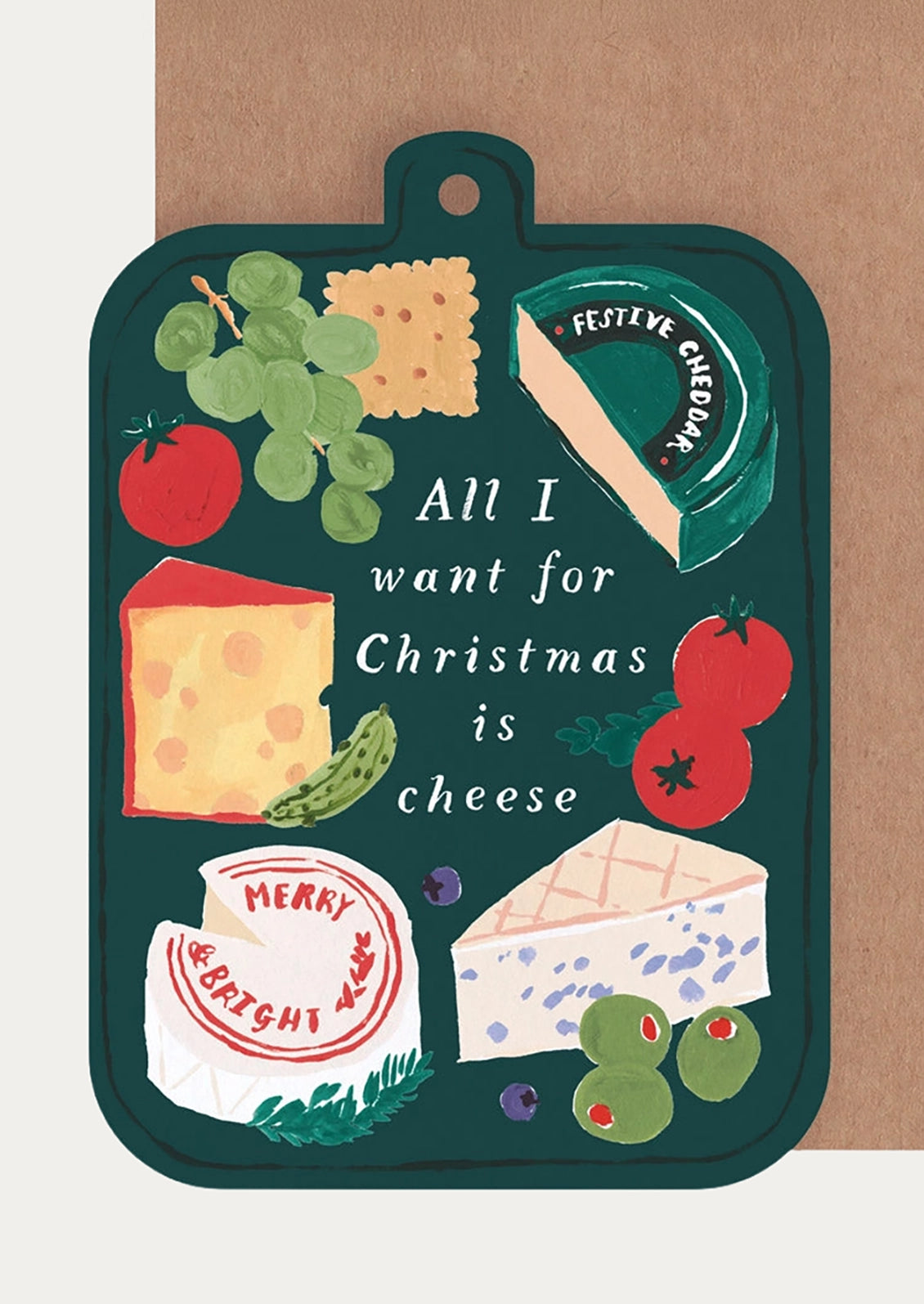 A dark green Christmas-themed cheese board with illustrations of various cheeses, grapes, tomatoes, crackers, and olives, featuring the text 'All I want for Christmas is cheese'.