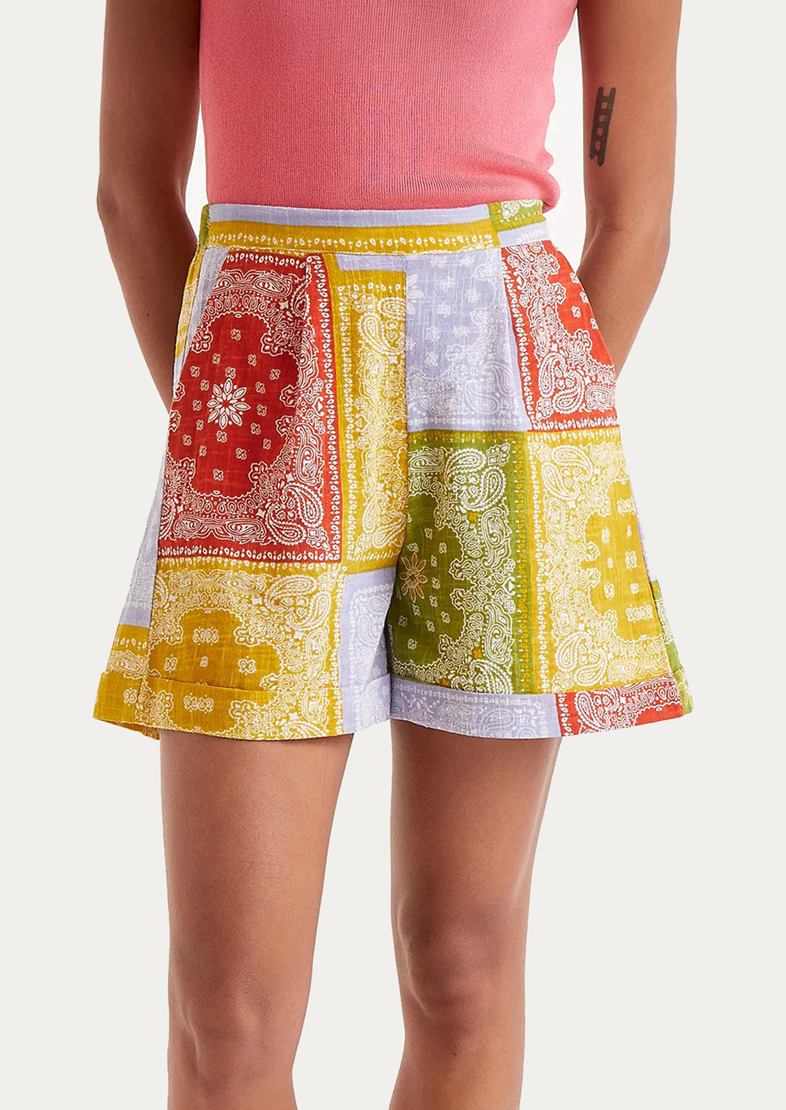 A pair of shorts with primary color bandana patchwork print.