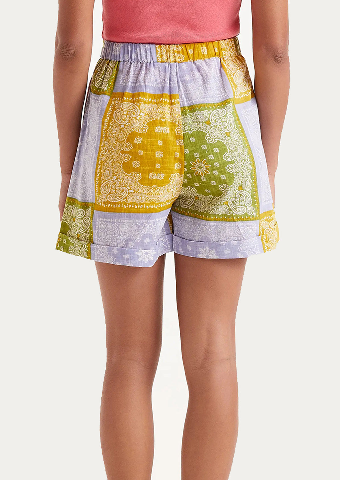 A pair of shorts with primary color bandana patchwork print.