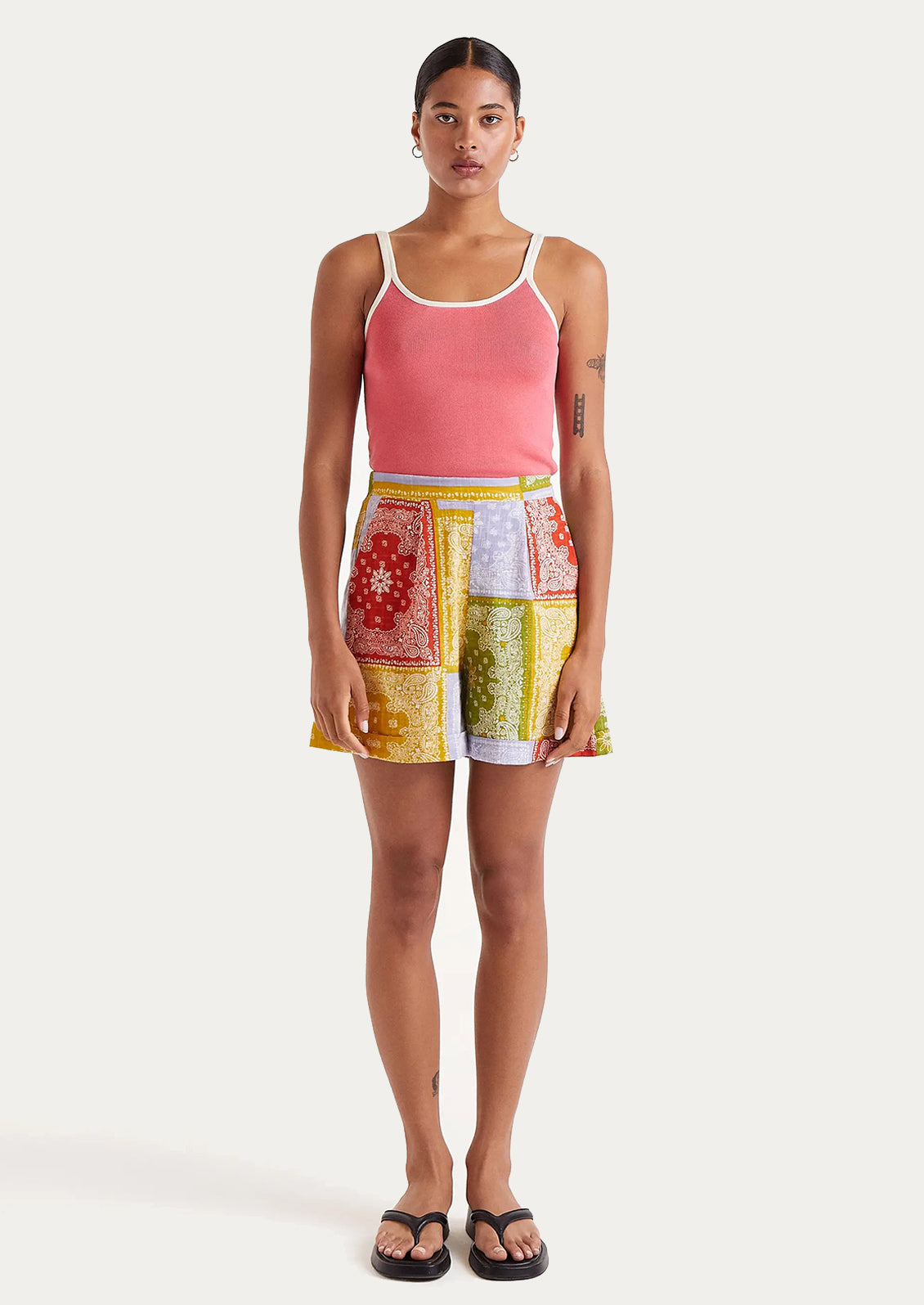 A pair of shorts with primary color bandana patchwork print.