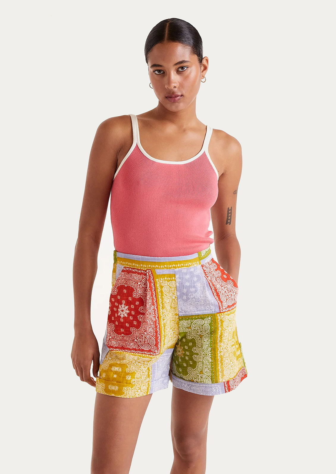 A pair of shorts with primary color bandana patchwork print.
