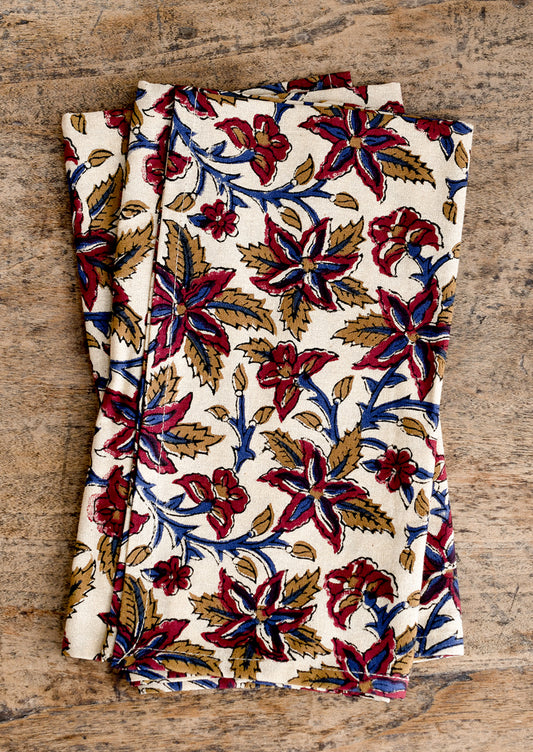 Floral patterned fabric on a wooden surface