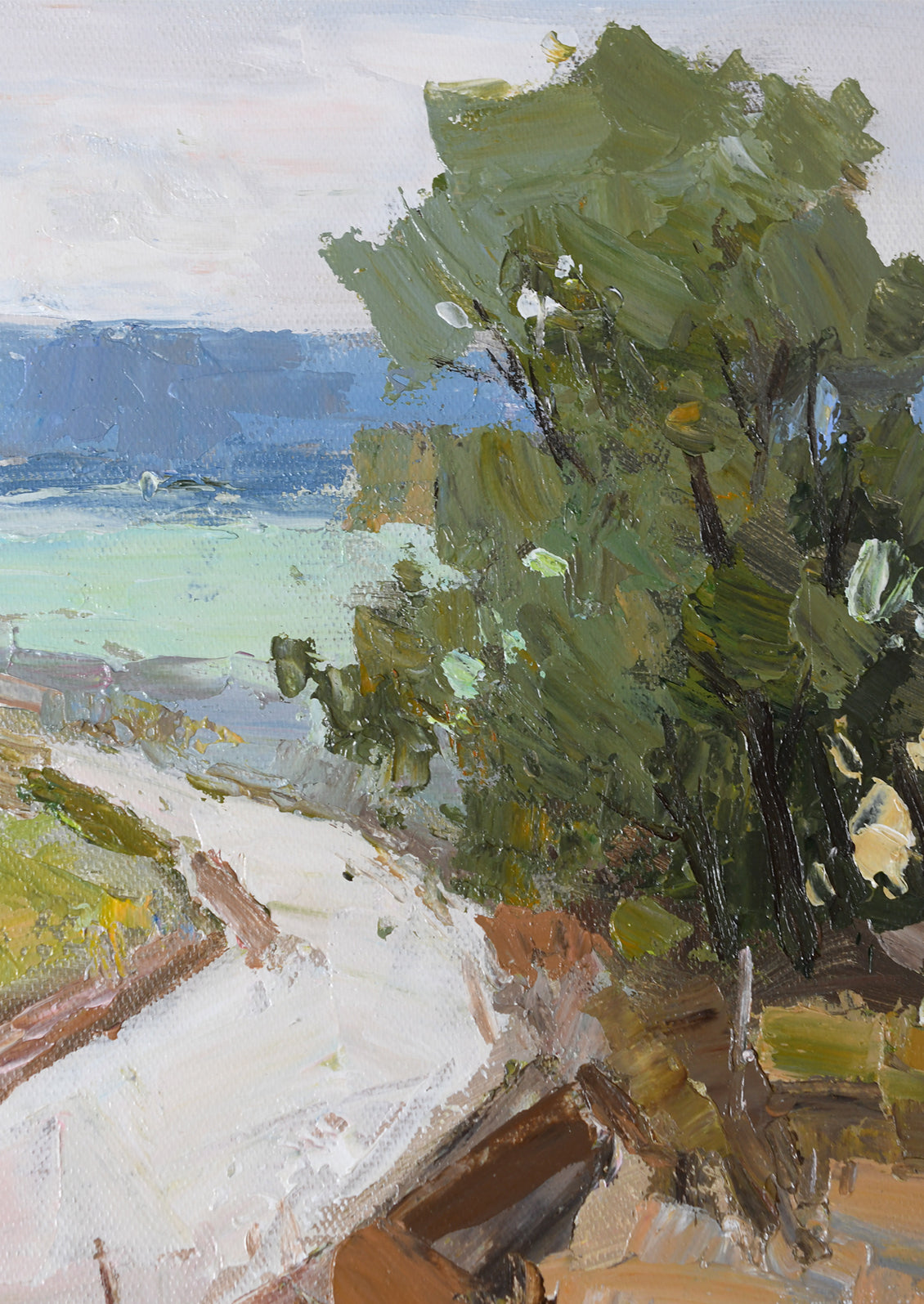 Impressionistic landscape painting featuring a large green tree in the foreground, a pale path or road below, and blue water or sky in the distance.