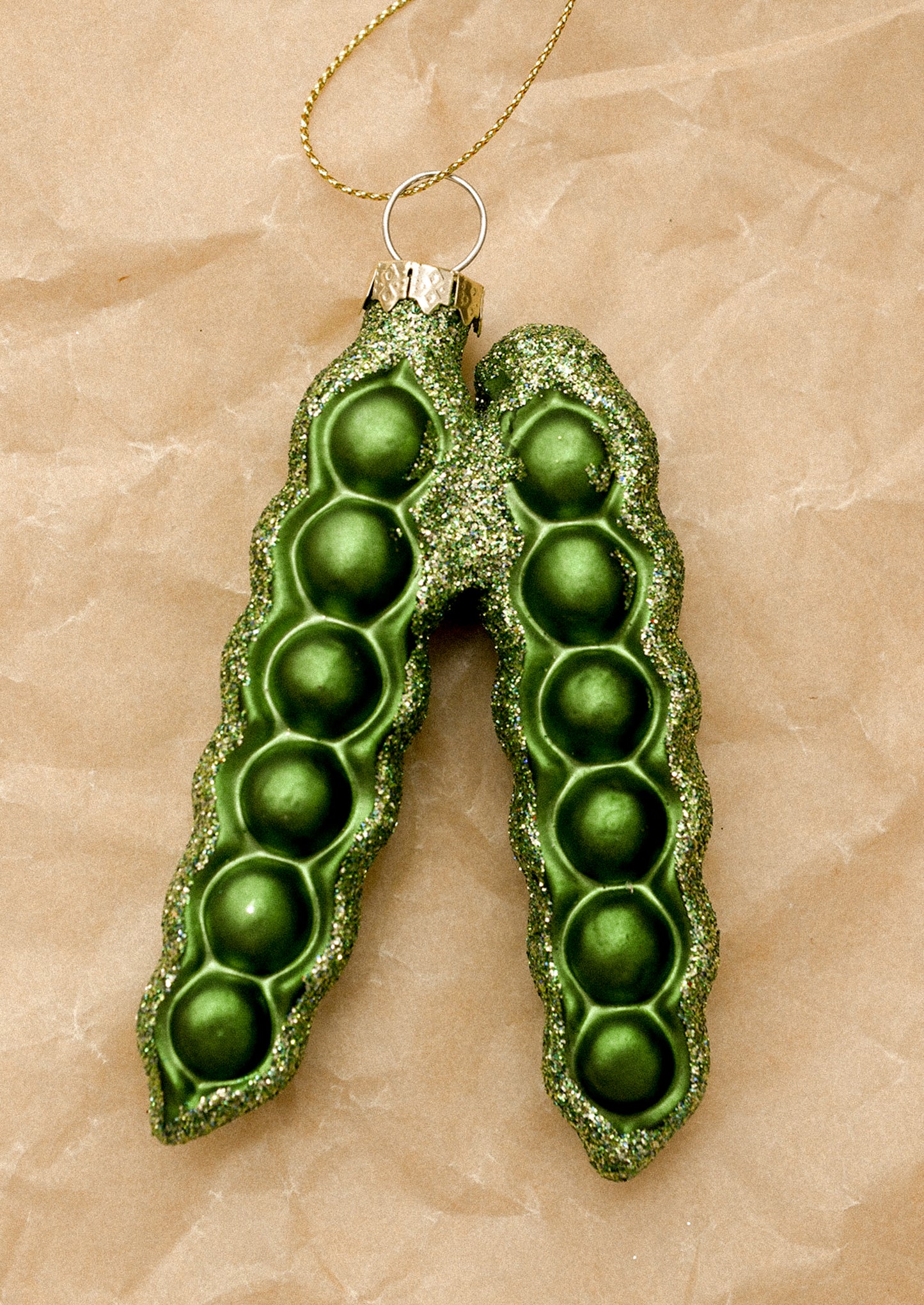 Green pea pod ornament.
