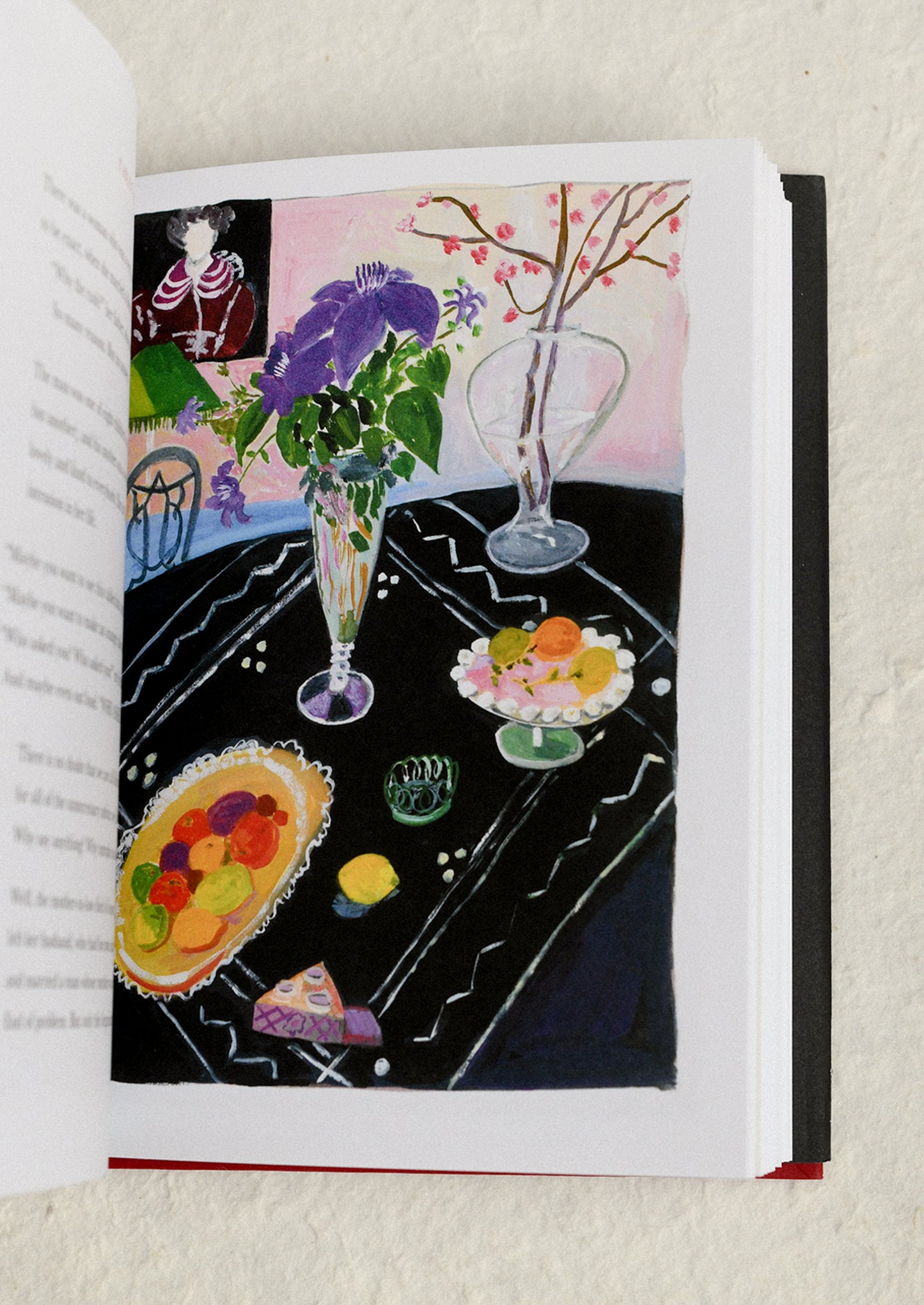 Illustration of a table with food and flowers in a book
