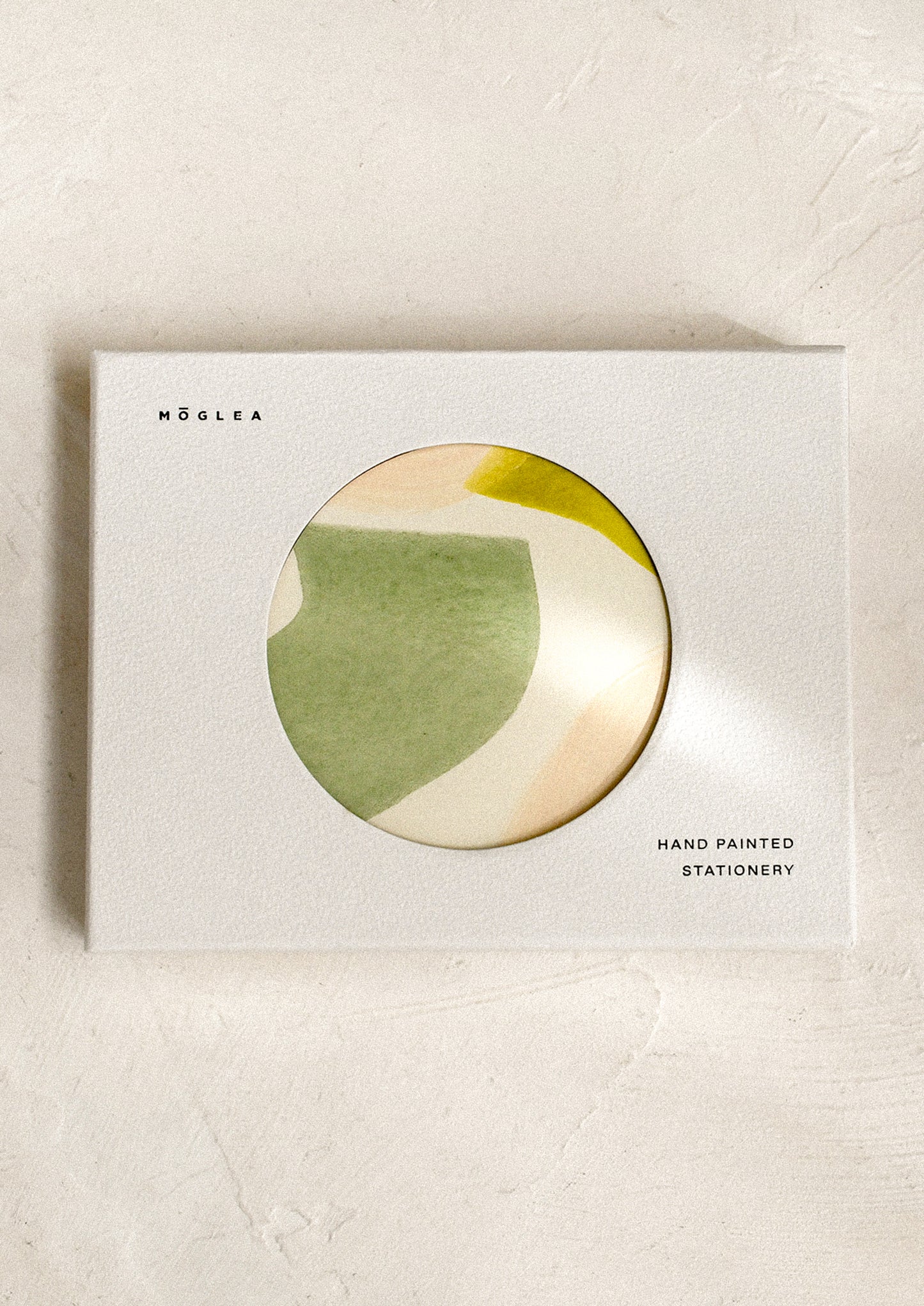 A set of blank greeting cards with colorful abstract pattern on front.