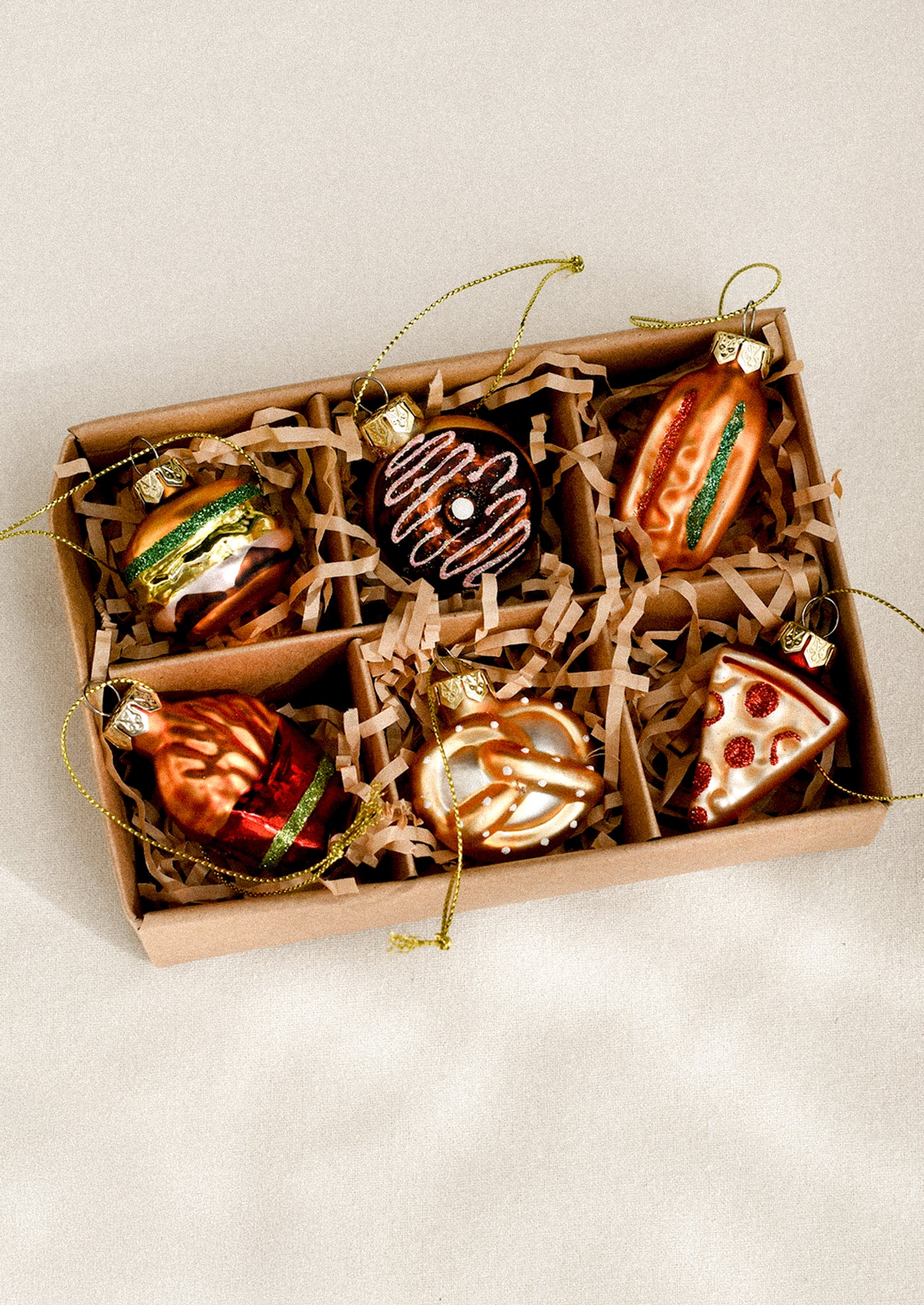 Boxed set of assorted junk food glass ornaments.