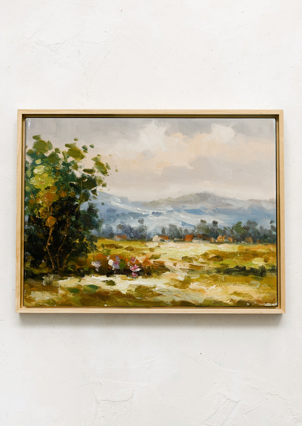 1: A framed original oil painting of countryside landscape.