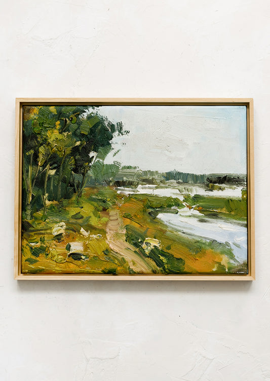 An original landscape oil painting in maple frame.