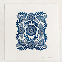 1: A woodcut floral print block print in indigo ink.