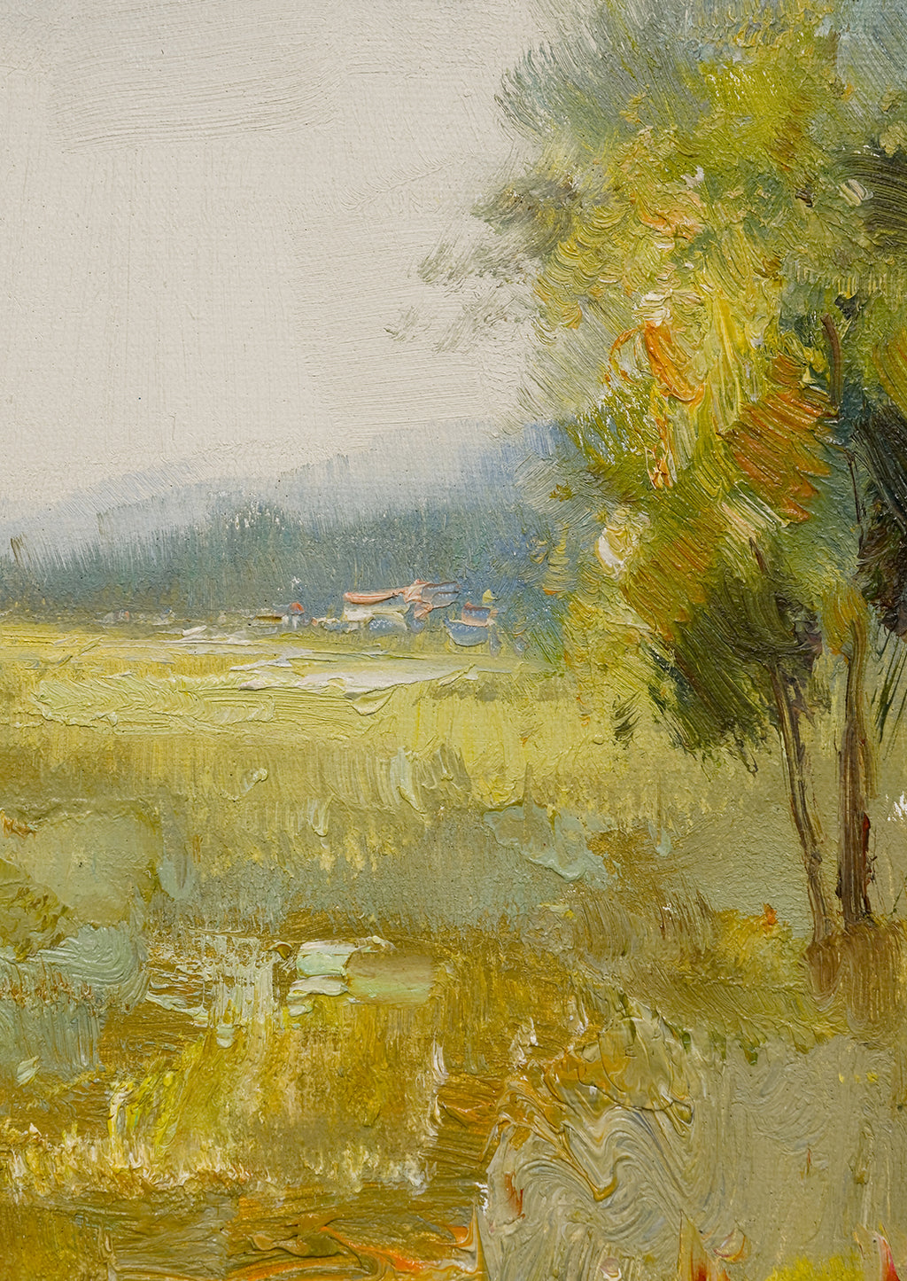 2: A framed oil landscape painting of a yellow-green meadow.