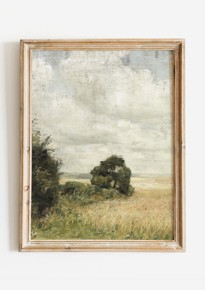 An antique inspired landscape art print of tree in wheat field.