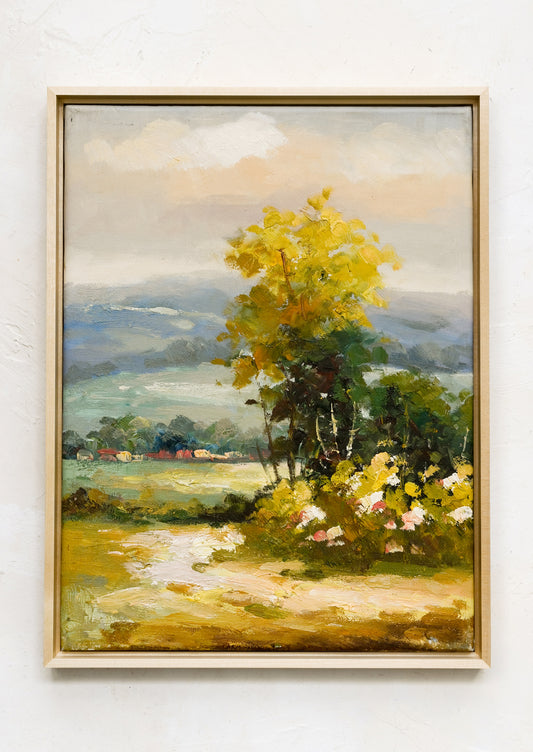 An original oil landscape painting with tree and houses in distance.