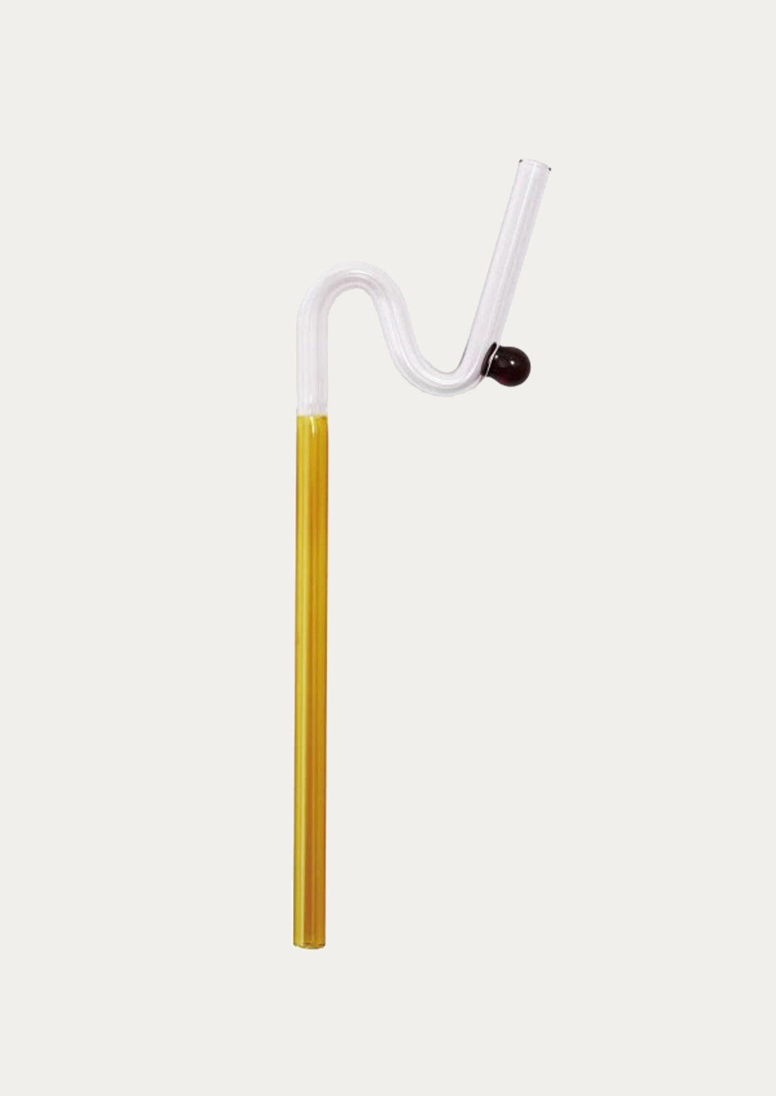 Glass straw with a yellow accent on a white background