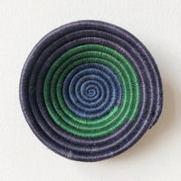 Navy / Kelly Green / Cobalt: A woven sweetgrass bowl in navy and green.