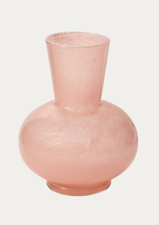 Pink glass vase on a white background
