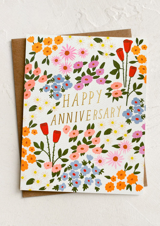 Greeting card with floral design and 'Happy Anniversary' text on a white background