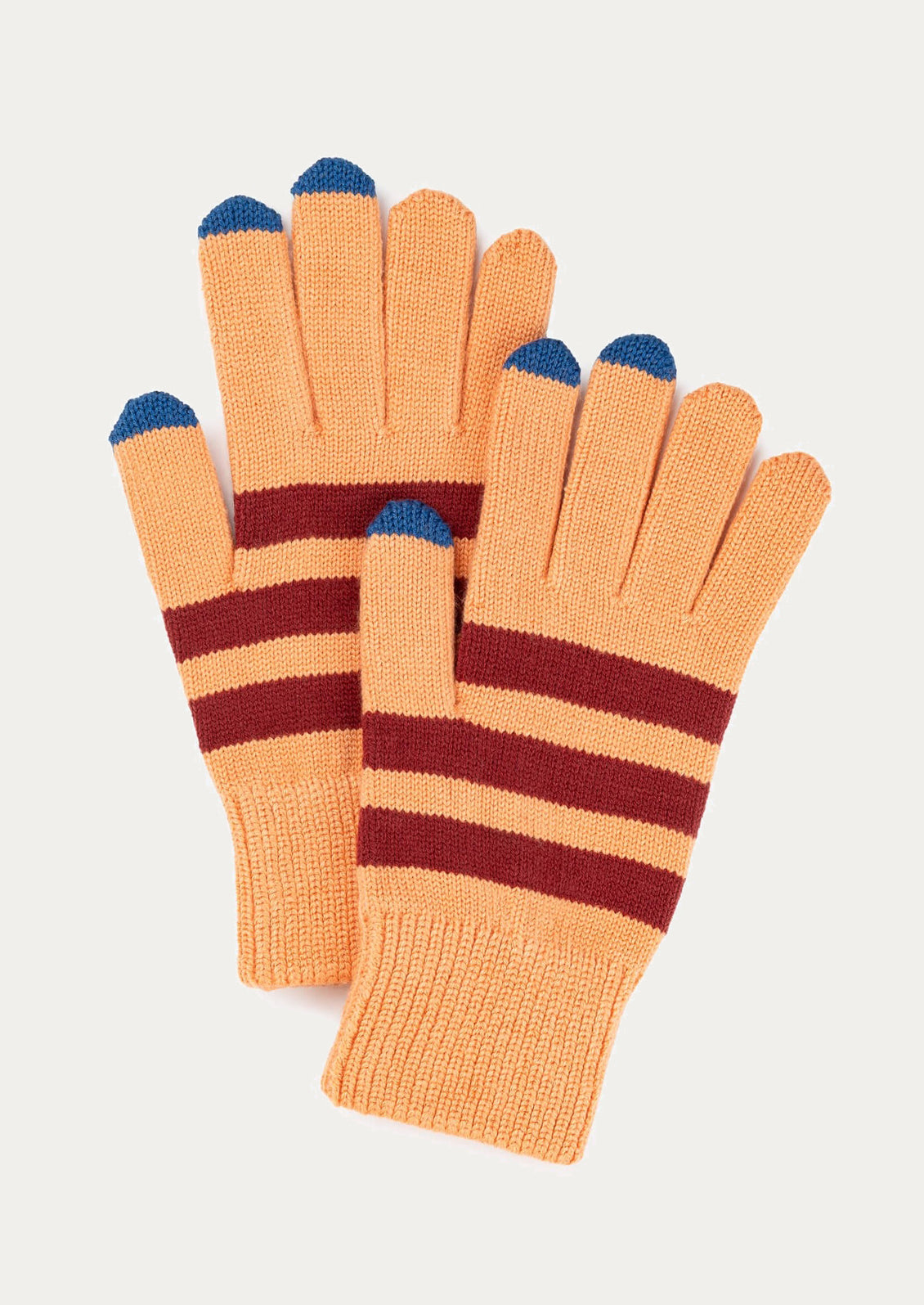 Pair of striped gloves with orange and brown pattern on a white background