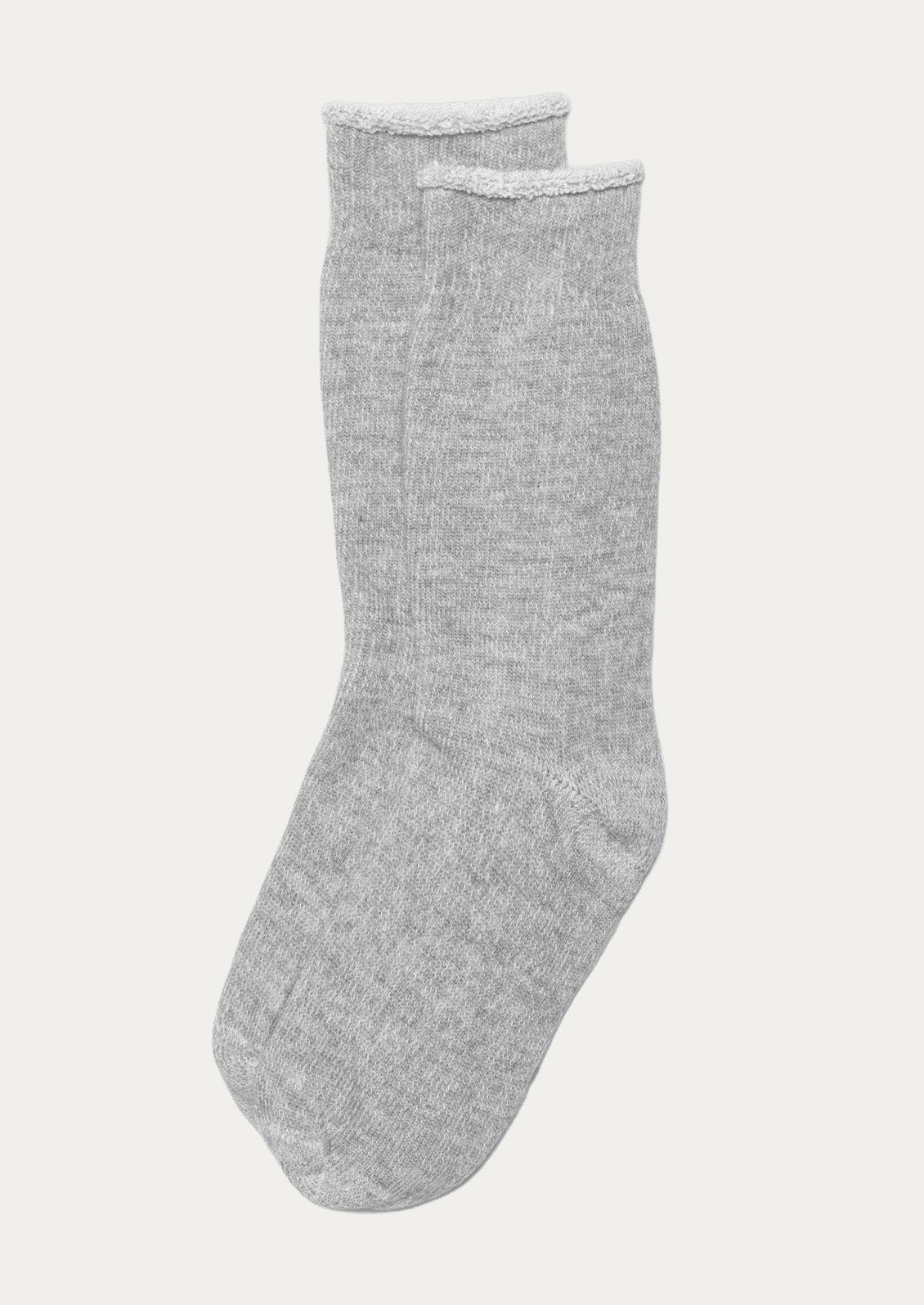 A pair of light grey cotton blend calf-length socks.