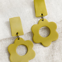 Split Pea: A pair of clay flower earrings with bar-shape post back in split pea.