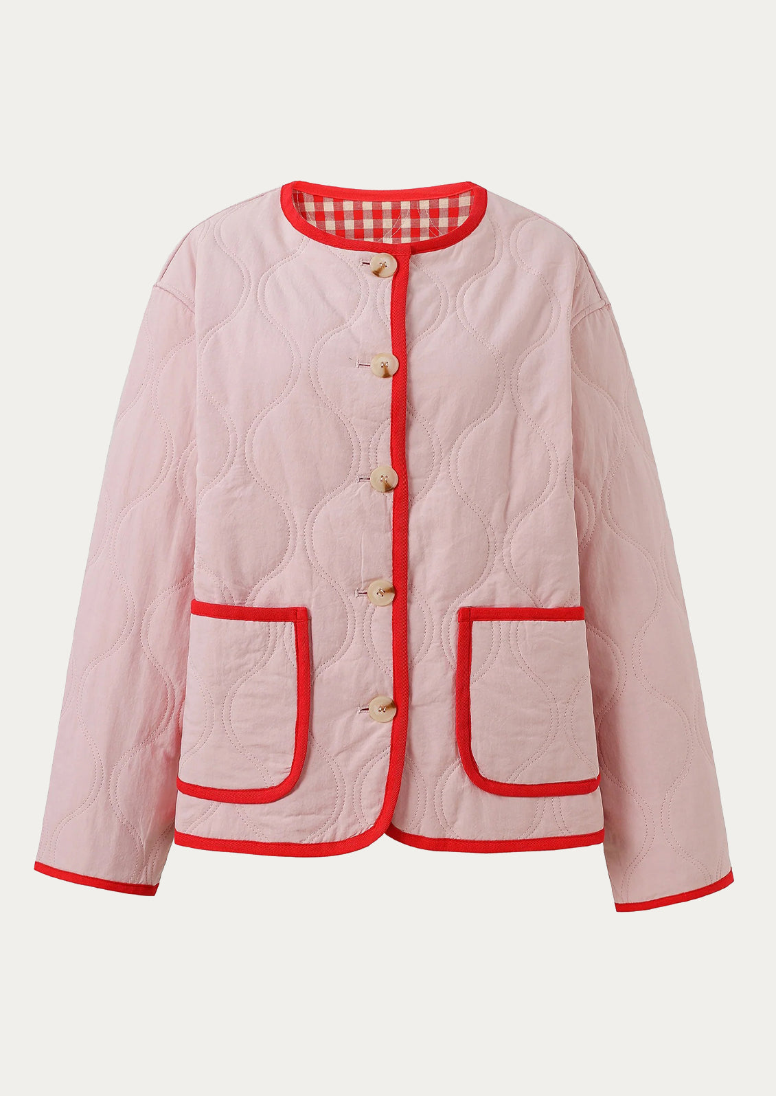 Pink quilted jacket with red trim on a white background