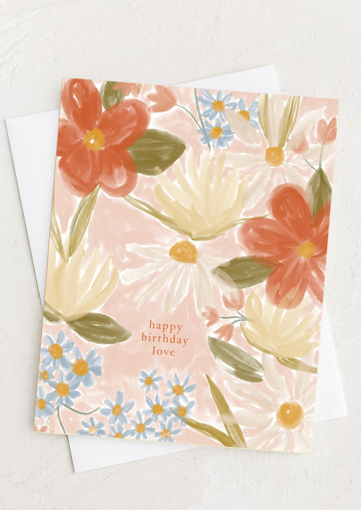 A floral print card reading "Happy birthday love".