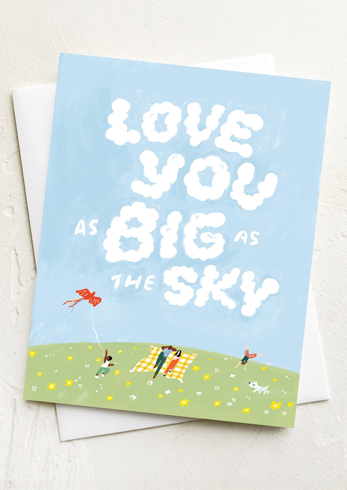 A greeting card with cloud illustration, text in clouds reads "Love you as big as the sky".