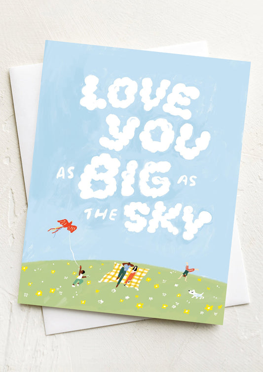 A greeting card with cloud illustration, text in clouds reads "Love you as big as the sky".