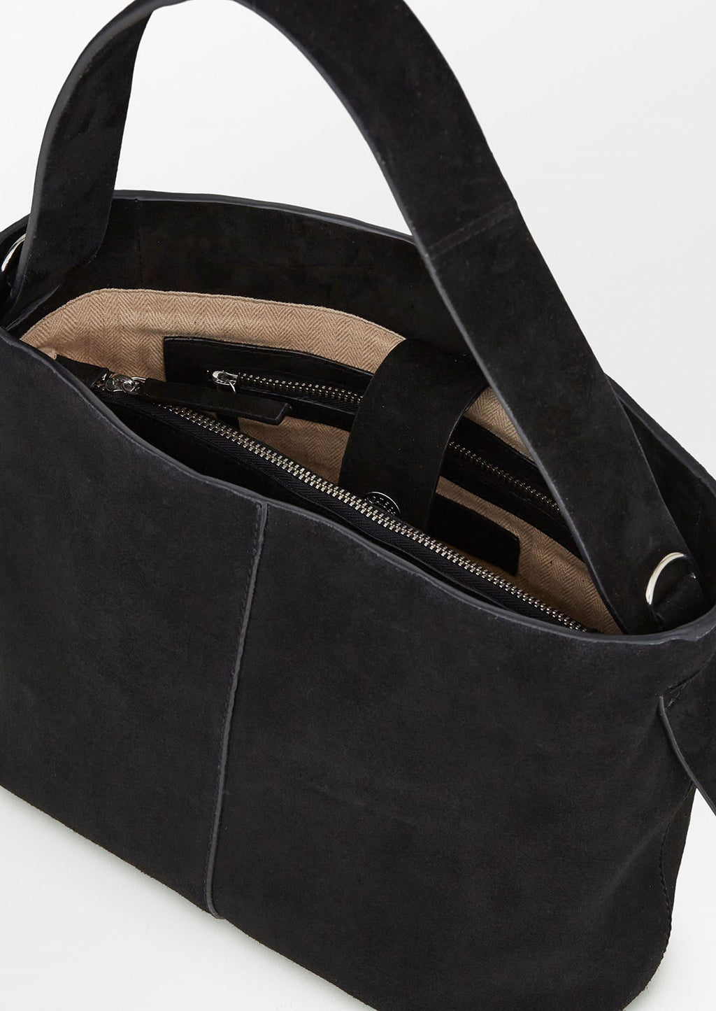 4: A suede handbag in black.