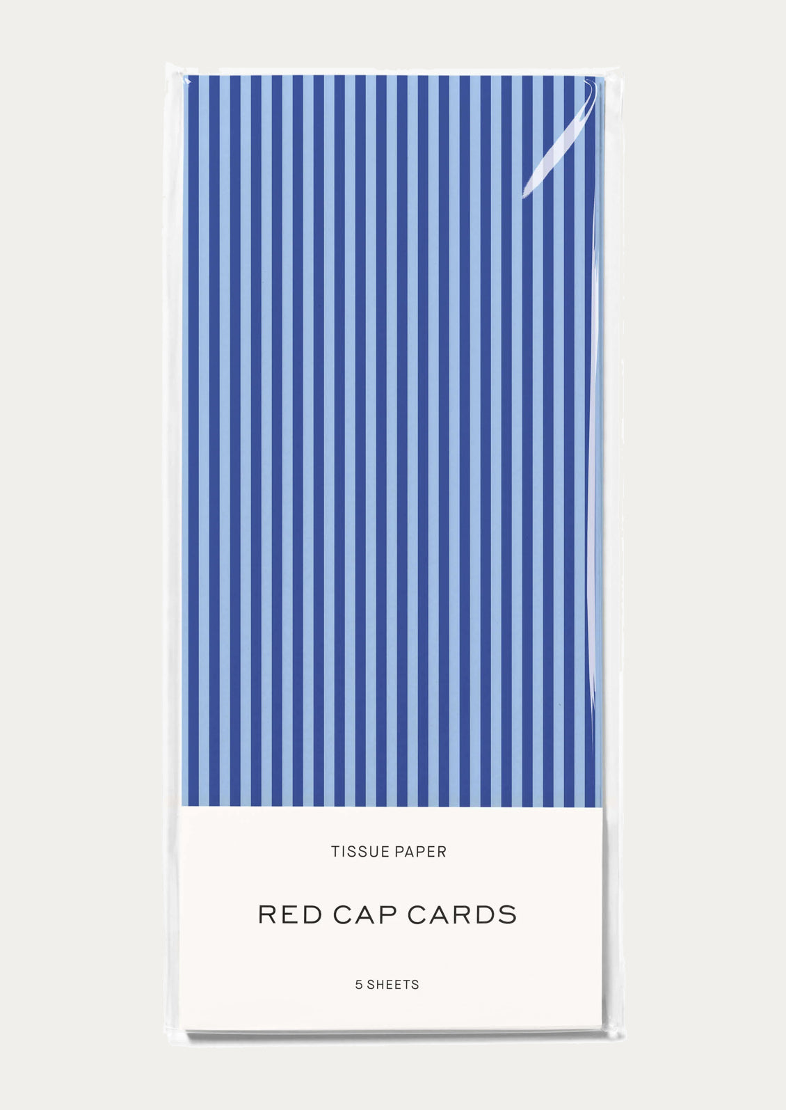 A pack of tissue paper with a blue and white vertical stripe pattern.