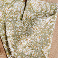 Dried Sage Multi: A pair of block print napkins in sage green with floral print.