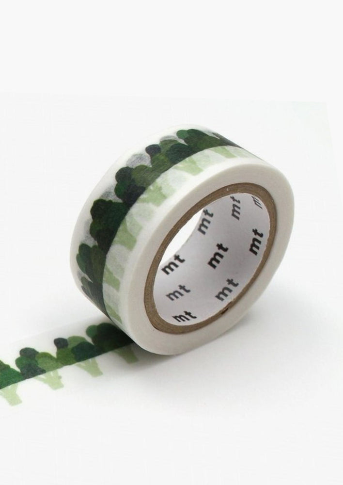 A roll of washi tape with green broccoli pattern.