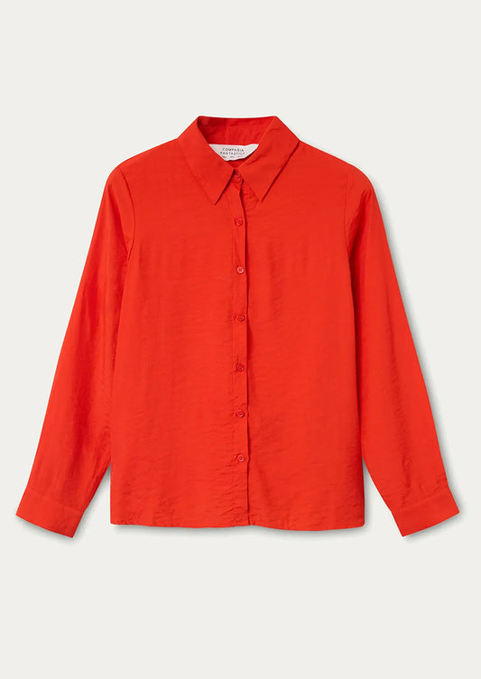 A vibrant red-orange button up collared shirt.