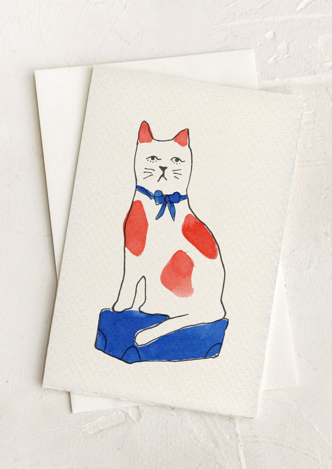 Note card with a red and white cat illustration wearing a blue bow tie on a white background