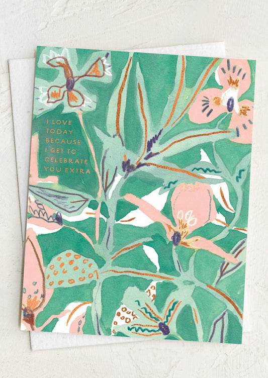 Greeting card with floral design and text.