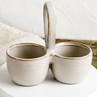 White: A double cellar ceramic vessel in off-white glaze.