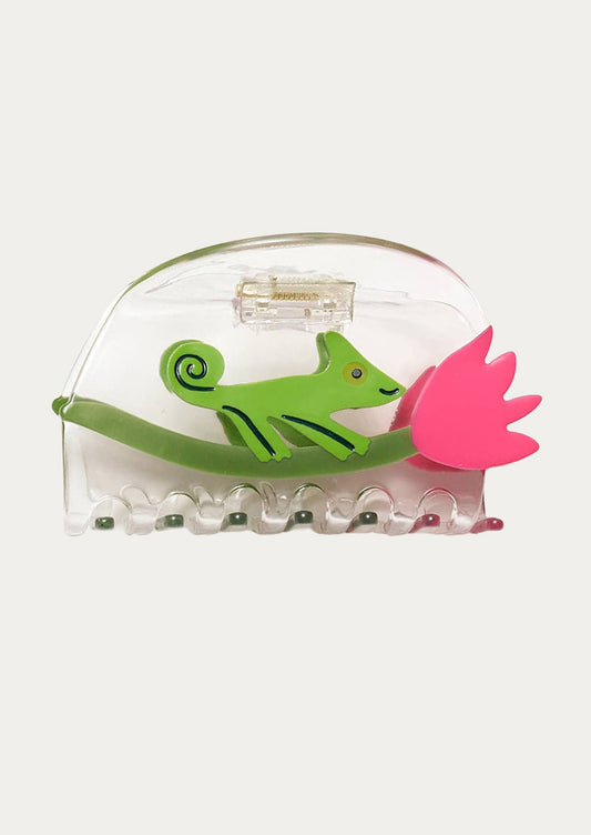 A clear claw clip with a green chameleon and pink tulip on a white background.