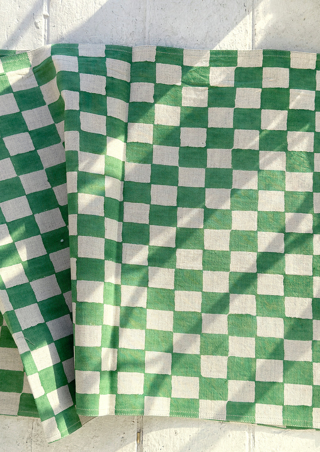 Clover: A linen table runner in clover green checker print.