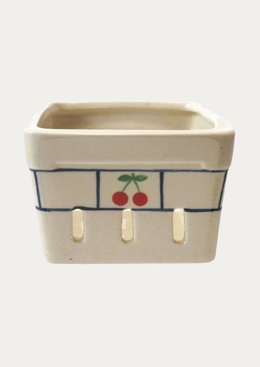 Ceramic berry basket with a cherry design.